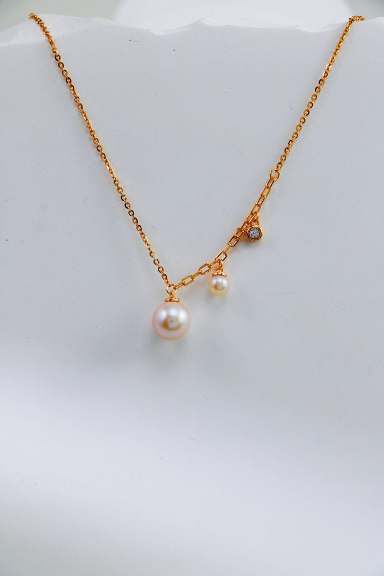 Hypoallergenic and waterproof Adaline Necklace with an elegant pearl pendant for timeless style.