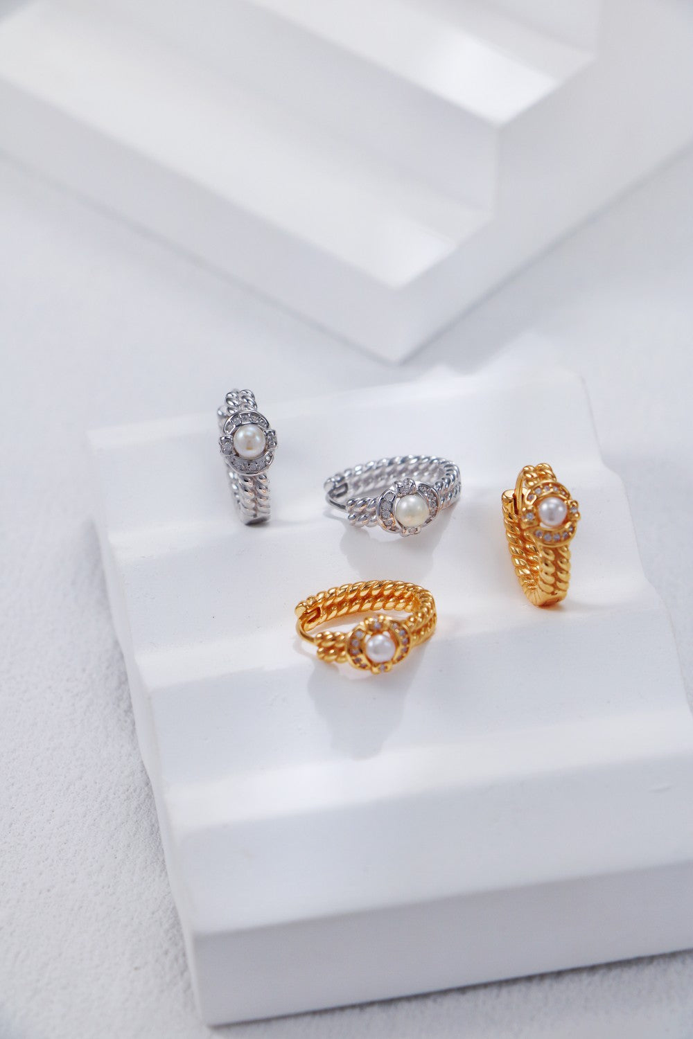 Elegant pearl hoop earrings with a modern twist, available in both Silver and Gold | Shop affordable luxury earrings at Mezuille