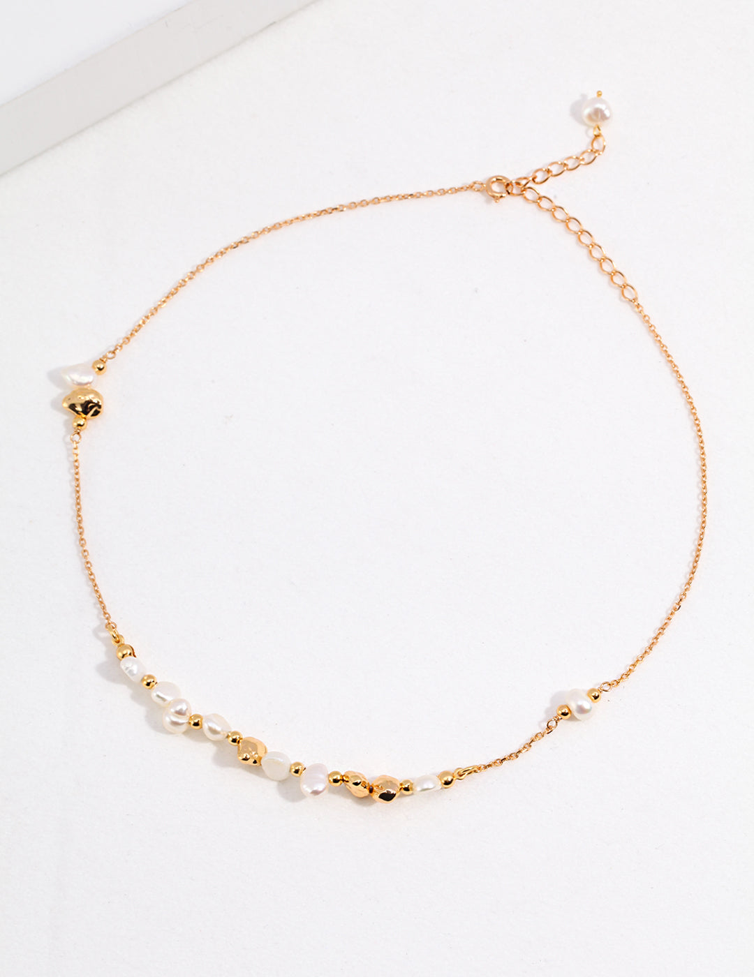 Dainty pearl accent on gold chain necklace