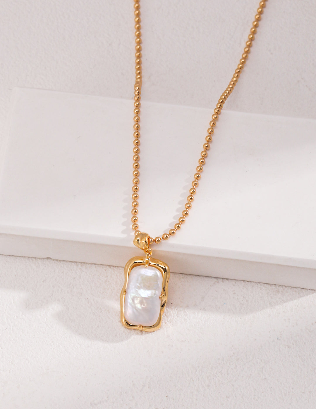 Elegant gold plated freshwater pearl necklace.