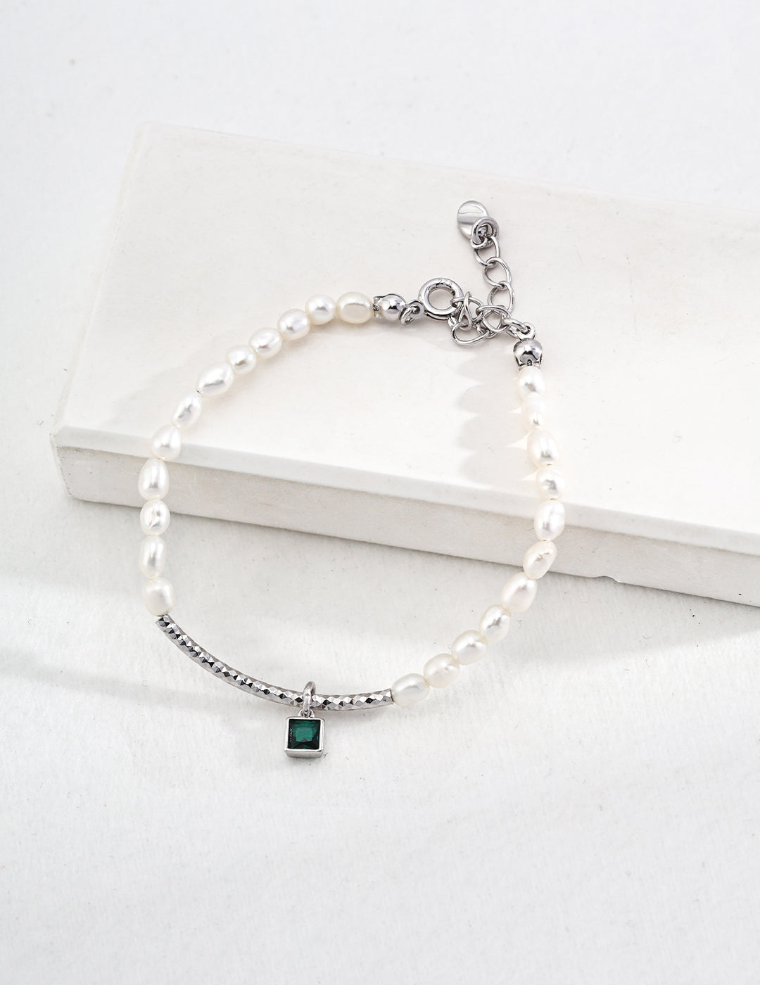 Mezuille S925 silver bracelet with freshwater pearls and sparkly cubic zirconia charm.