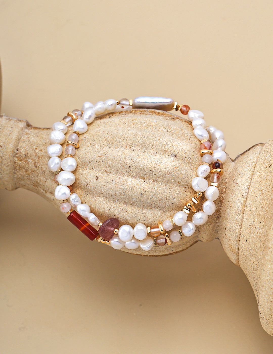 Matching bracelet with white and red beads to complement freshwater pearl necklace.