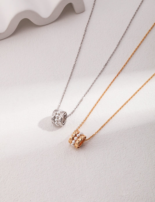 Stunning necklaces: one silver with pearl beads, one gold with pearl beads, both exquisite.