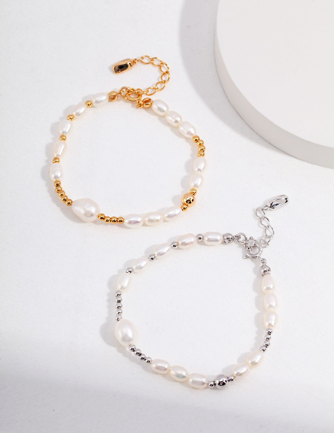 Stylish gold and silver beaded freshwater pearl bracelets with a touch of sophistication.