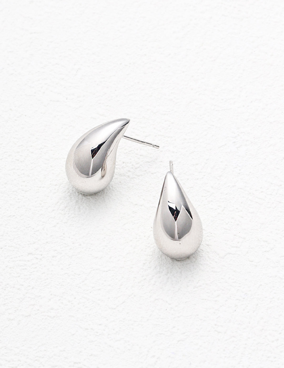 Classic silver teardrop earrings, a timeless addition to your jewelry collection.