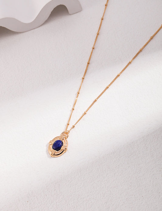 Gold chain necklace with lapis lazuli stone pendant