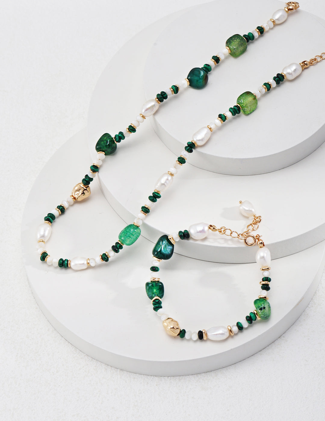 Green and gold jewelry set with Agate, Freshwater Pearls, Malachite, Nacre; includes necklace and bracelet.