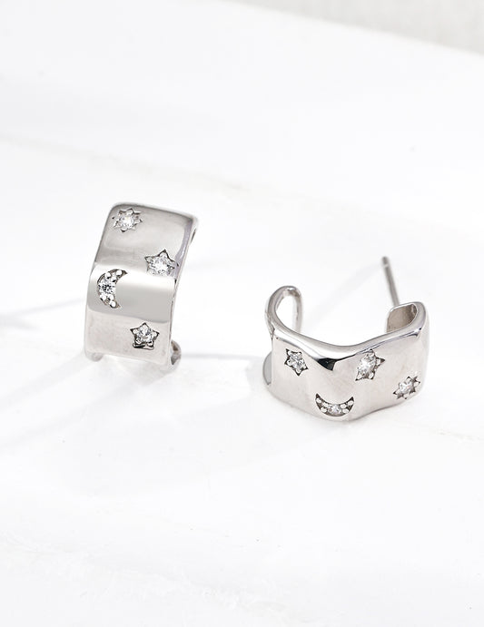 Silver C-Shaped Hoops. from Mezuille, with celestial zirconia accent, displayed on white background