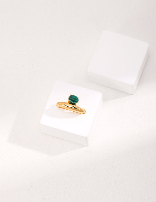 Beautiful gold plated ring adorned with a vibrant green malachite stone.