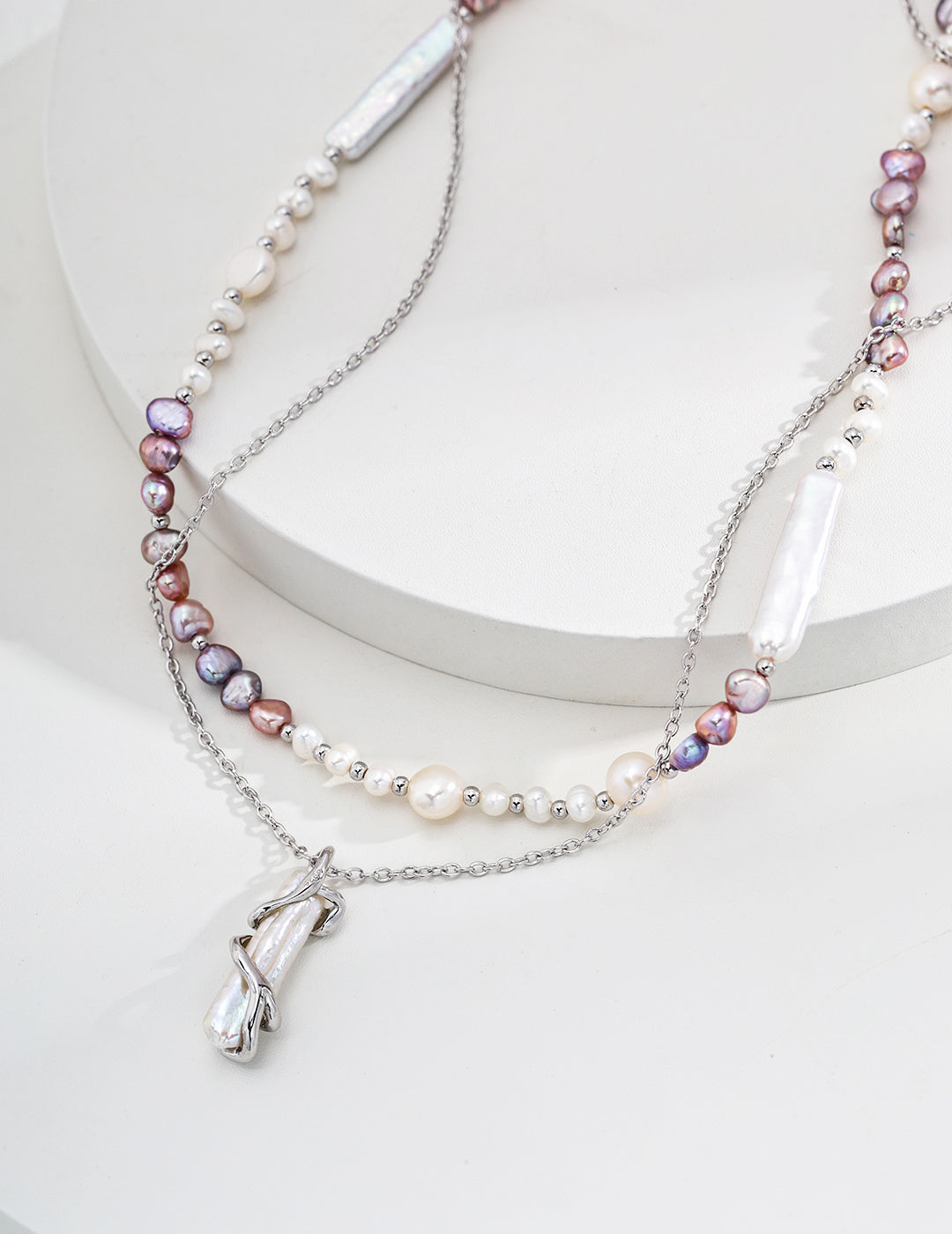 Stunning lavender necklace adorned with a pearl and silver pendant, ideal for enhancing your jewelry collection.