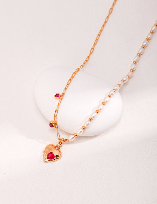 Beautiful gold necklace with a heart charm, accented by corundum, radiating love and sophistication.