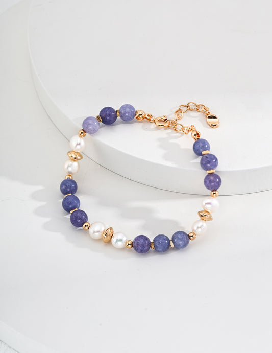 A beautiful bracelet featuring purple and white beads, showcasing the elegance of kunzite gemstones.