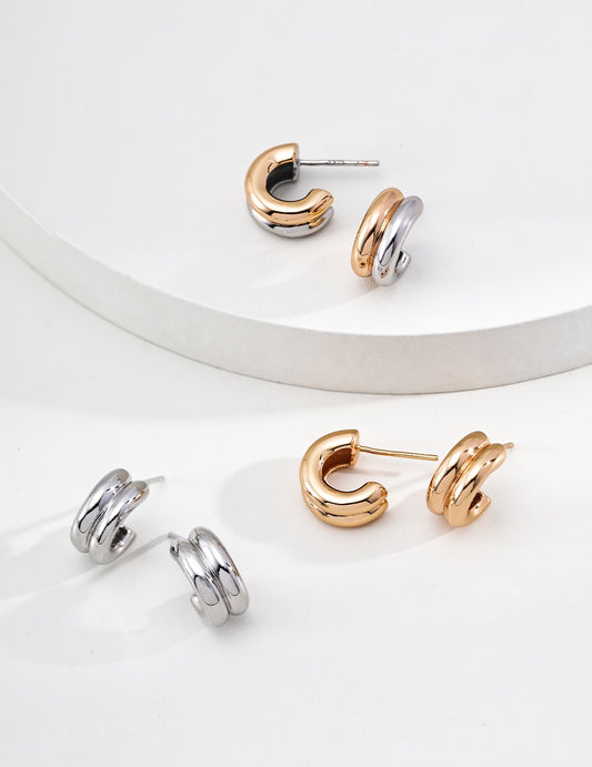 Three pairs of silver and gold sculptural Maxine Earrings in S925 Silver, by Mezuille.