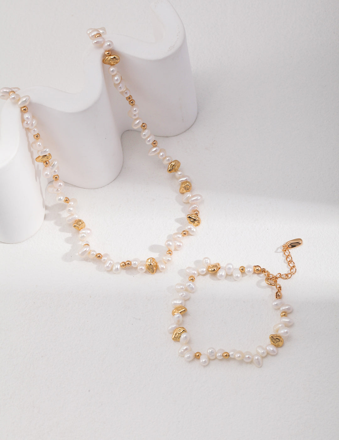 Gold beads necklace and bracelet set, featuring stunning gold pearls for a luxurious and elegant look.