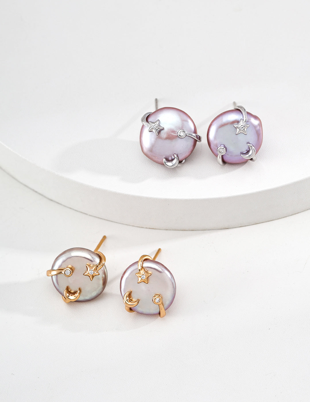 A clean side-by-side comparison image showing both the silver and gold vermeil Vesper Studs, illustrating the two finish options available.