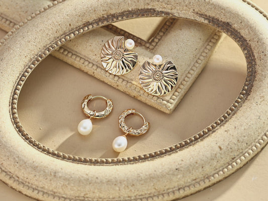 Two sets of gold accent pearl earrings in S925 Silver by Mezuille, on neutral background.