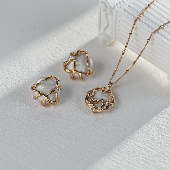 Video showing the luster and detail of the Alexi Baroque pearl studs and matching pendant necklace under soft, natural lighting.